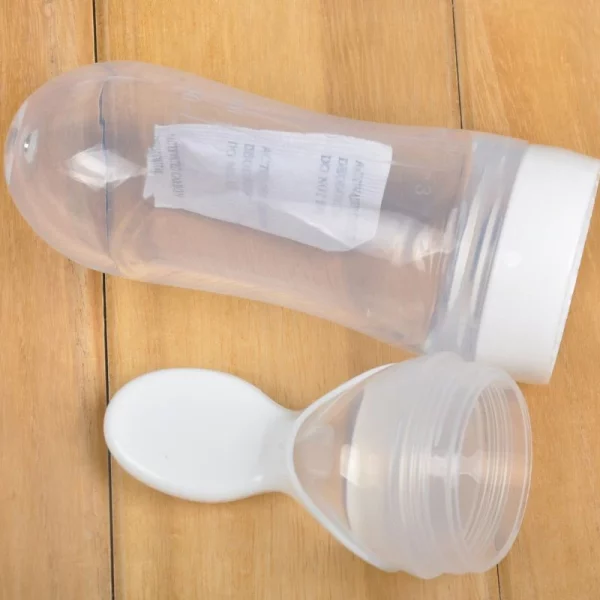 2024_04_Safe-Useful-Silicone-Baby-Bottle-With-Spoon-Food-Supplement-Rice-Cereal-Bottles-Squeeze-Spoon-Milk-Feeding.jpg_Q90.jpg_-1-600x600-1 Baby Spoon Feeder Silicone Bottle Feeding (Random Color)