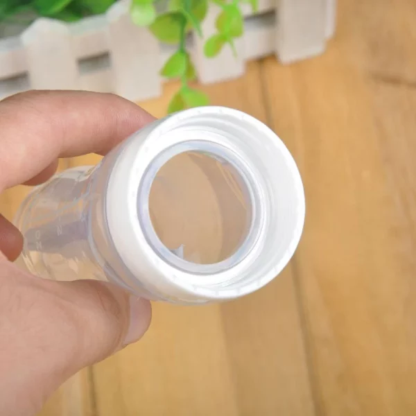 2024_04_Safe-Useful-Silicone-Baby-Bottle-With-Spoon-Food-Supplement-Rice-Cereal-Bottles-Squeeze-Spoon-Milk-Feeding.jpg_Q90.jpg_-2-600x600-1 Baby Spoon Feeder Silicone Bottle Feeding (Random Color)